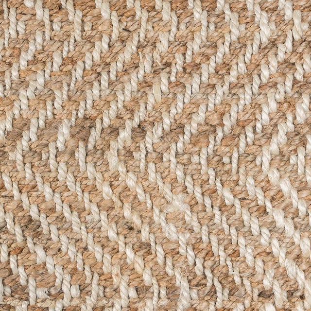 Hand woven jute and wool rug in natural and ivory tones. Stylish chevron pattern. Available in numerous sizes. Please note...