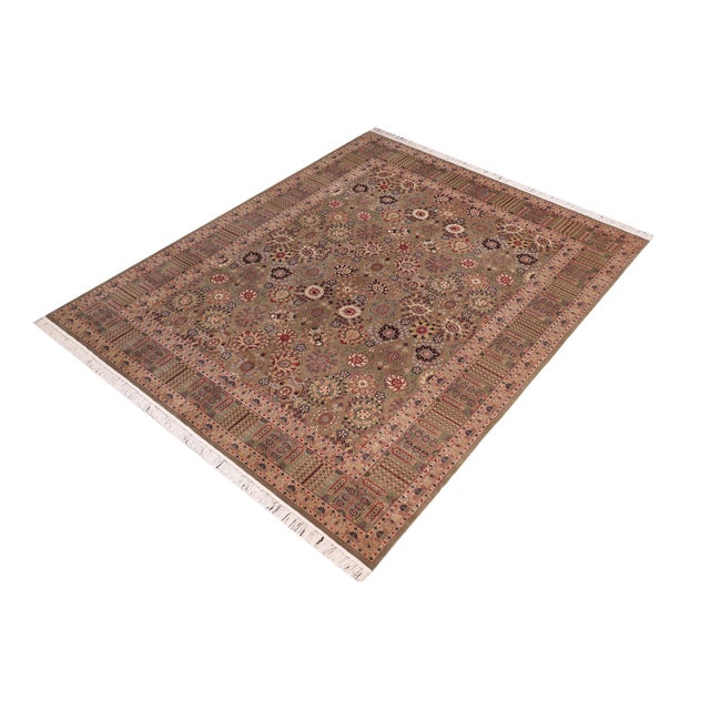Designed with mesmerizing intricacy and gorgeous color palette, this hand-knotted masterpiece demonstrates the beauty and...