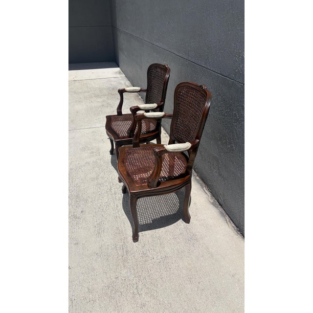 This is a beautiful pair of wood and cane French Bergere chairs. The backs are double cane and the Seats are single cane....