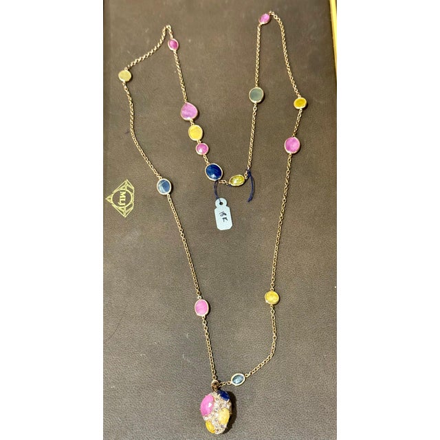 Approximately 80 ct Bezel-Set Multi-Sapphire Station Necklace With diamonds 18kt Gold 35 Inch long Bezel-Set Multi-...