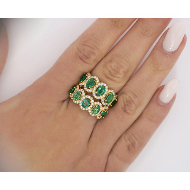 Natural Emerald and Diamond Wedding Band in 18k Solid Yellow Gold. This wedding band contains 5 emerald stones. Each stone...