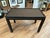 A beautiful faux snakeskin leather game table with a removable top. The top is two sided and the bottom is covered in felt...