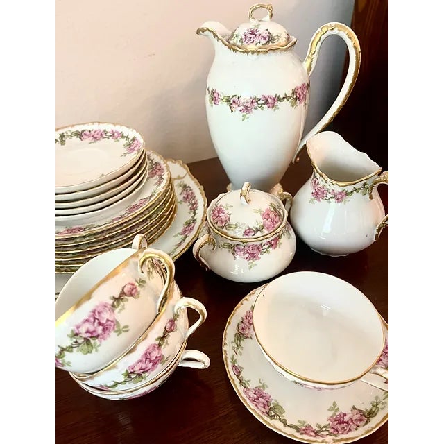 A gorgeous 21 piece antique Limoges Tea Set crafted in Limoges France around 1900. This tea set would have been imported...