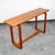 Danish designed solid teak console table. Extremely well made. Great piece for behind the sofa or as an entryway table....