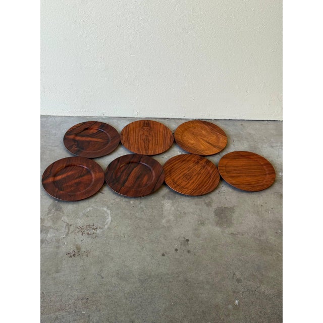 Beautiful set of Mid-Century Modern rosewood plates crafted by Morsbak, Denmark, circa 1960s. Each plate showcases rich,...