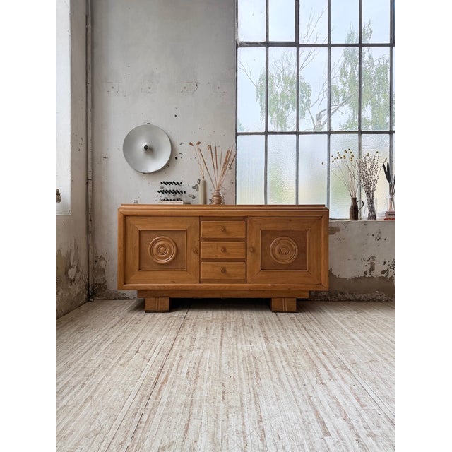 Antique sideboard or storage unit in solid oak and oak veneer on the top, dating from the 1940s. Reminiscent of the work...