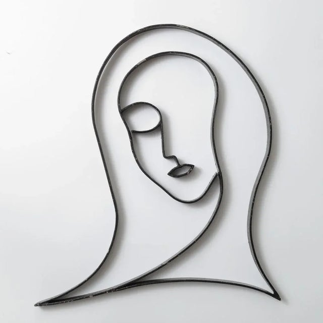 Pair of head sculptures (man and woman). Made of bent steel flat-bar in the 1980s. Man head: height 49 cm width 29 cm...