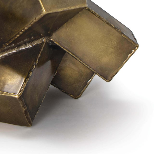 Tastefully accentuate any space with this futuristic and sophisticated sculpture made from substantial materials,...