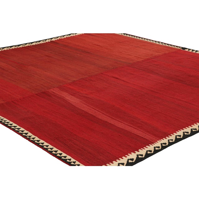 Handwoven in a wool flatweave, originating circa 1950-1960, this 10x10 vintage Turkish square kilim is an excellent...