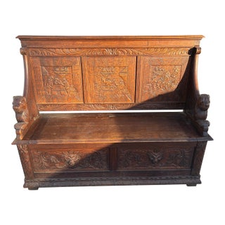 Mid 19th Century Victorian Oak Monk's Bench or Settle With Carved Lion Arms and a Hinged Seat For Sale