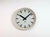 This large wall clock was produced by Pragotron in former Czechoslovakia during the 1960s. It features a beige bakelite...