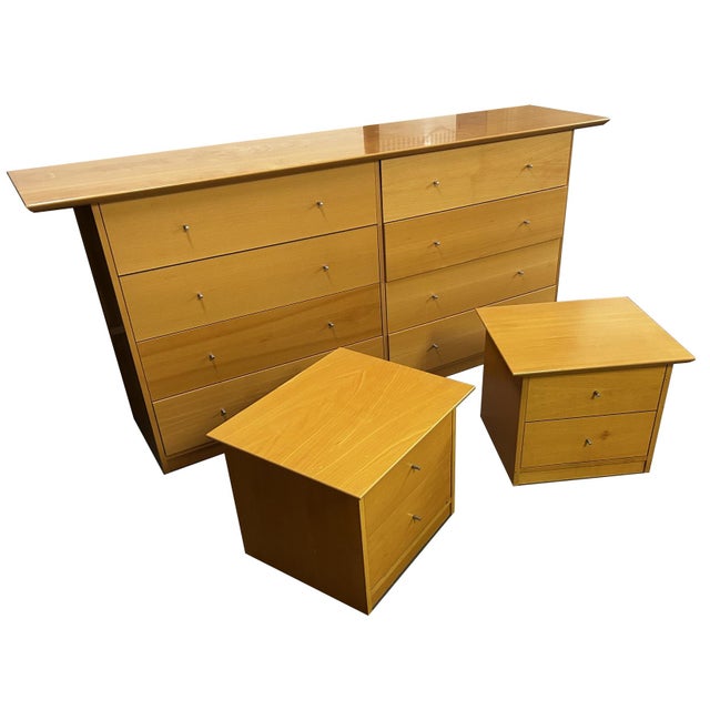 A beautifully coordinated Mid-Century Modern Scandinavian-style bedroom set consisting of one long 8 drawer dresser with a...