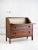 A mid century Brazilian rosewood drop front secretary desk. Rich wood grain with beige laminate accent panels. Sculpted...