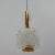 Ice glass and brass pendant made in Austria in the 1950s to 1960s by JT Kalmar. This piece is attributed to the mentioned...