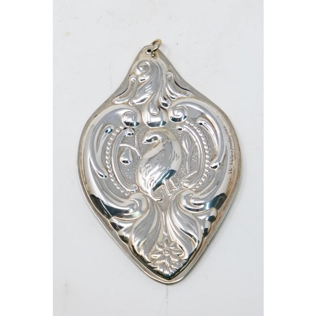 Offering this beautiful Wallace Sterling ornament from 1988. Depicting a Partridge in a Pear Tree in the center, then...