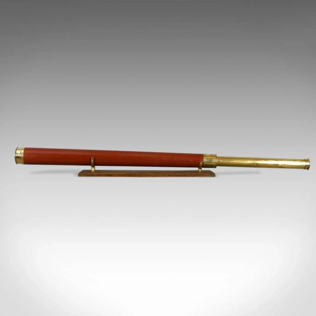 This is an antique telescope, a large single draw refractor for terrestrial or astronomical use. An English, late Georgian...