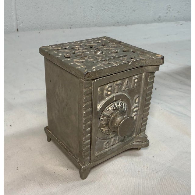Up for sale is a wonderful antique late 19th century cast Iron Safe still bank. It is a unique and collectible piece that...