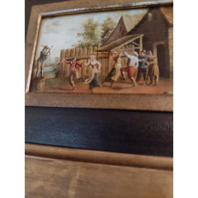 These are very finely painted on 1.75" by 3" Slightly convex glass in original 6.25" x 7.5" Gilt wood Frames. Upon closer...