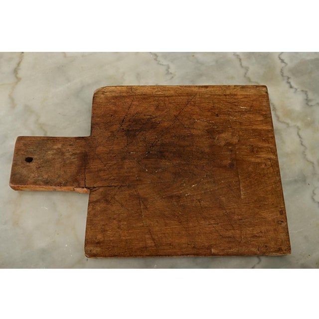 Straightforward in form and function, this chopping block from 19th century France is cut from a solid piece of beech wood...