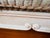 Late 20th Century Late 20th Century Large Louis XV Style French Provincial Carved Ottoman, Cream Painted Cabriole Frame, Neutral Woven Basketweave Upholstery For Sale - Image 5 of 13