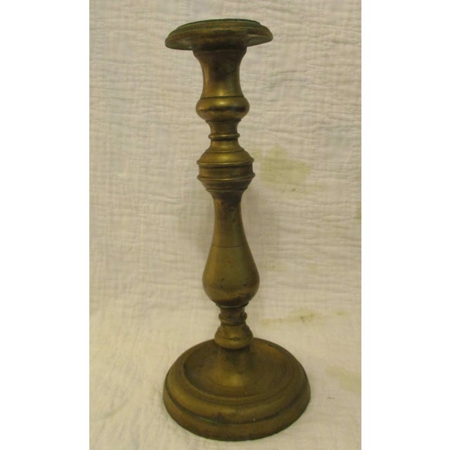 Matching Pair of 18th Century Heavy Brass Candlesticks Each measures 11.75" tall and have a 5.00" base diameter and a...