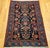"An exceptional Vintage Persian Malayer area rug, dating to the early 1900s. This captivating piece features an all over...