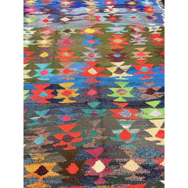 This is a striking and highly authentic room-sized antique Turkish Village Kilim,. Dating back to circa 1940, this vintage...