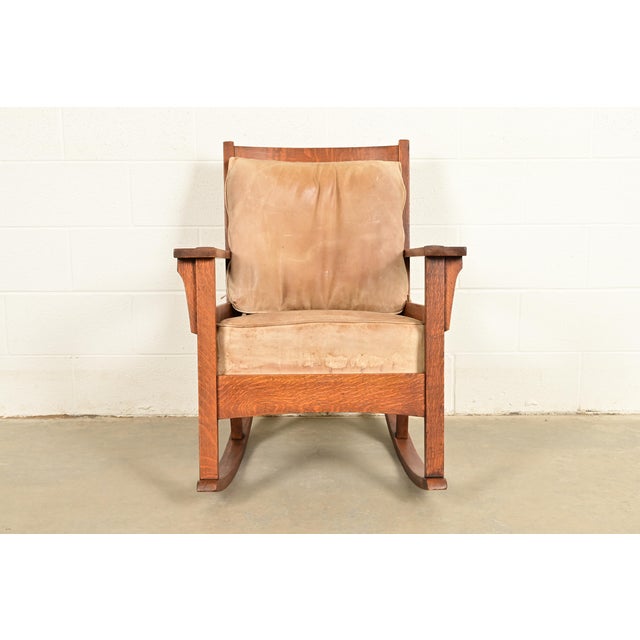 A gorgeous antique Mission or Arts & Crafts period rocking chair In the manner of Stickley Brothers USA, Circa 1910 Solid...