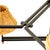 A brushed-steel arc nearly five feet wide, fitted with fabric shades that soften the light into something diffuse and...
