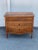 This is a beautiful vintage three drawer wooden chest. The front of the chest has wonderful details like the brass pulls...