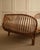 Italian production 1960s Daybed Bamboo and bent wicker frame; upholstered seat covered in a beige fabric.