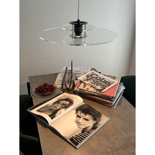 Bring Space Age Scandinavian design into your interior with the Space pendant lamp by Design Light Denmark, featuring the...