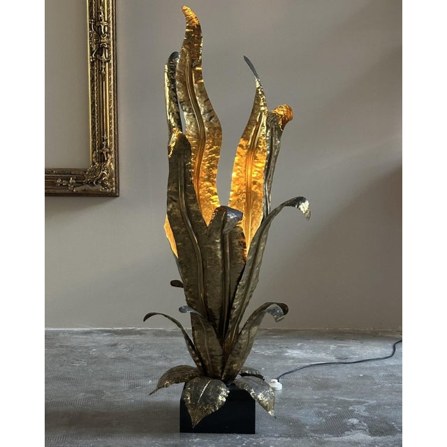 Hammered brass floor lamp dating back to the 1970s, attributed to Henri Fernandez, made for Maison Honoré. The lamp...