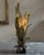 Hammered brass floor lamp dating back to the 1970s, attributed to Henri Fernandez, made for Maison Honoré. The lamp...