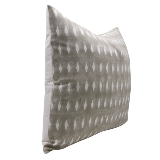 Elevate your living space with this block print handmade cushion cover, crafted from thick white cotton for a soft yet...