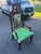An impressive high-back armchair blending Gothic Revival structural elements—such as carved tracery, trefoil cutouts, and...