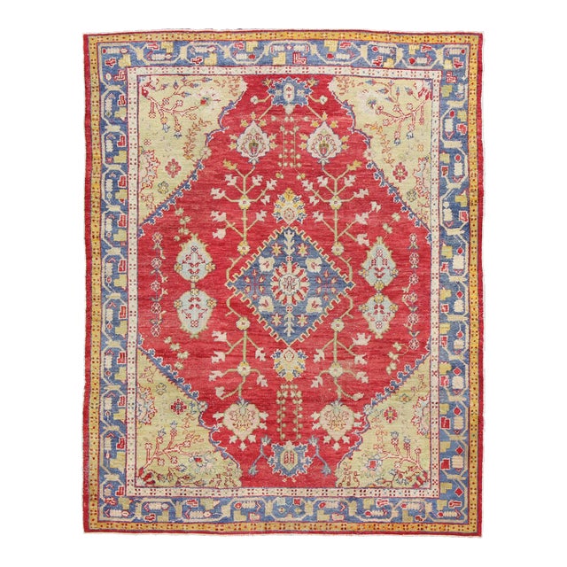 Early 20th Century Antique Turkish Oushak in Yellow Green, Red & Blue With Floral Medallion Design For Sale