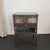 This industrial, brushed steel and glass, medical apothecary cabinet is a handsome storage piece that can serve a...