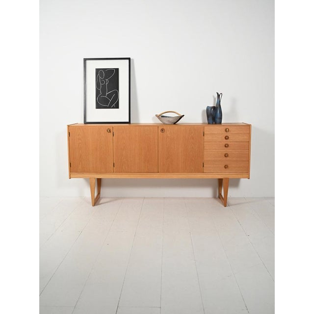 Scandinavian oak sideboard, model "Tokyo," designed by Ingvar Sandström for Nordiska Kompaniet, made in Sweden with...