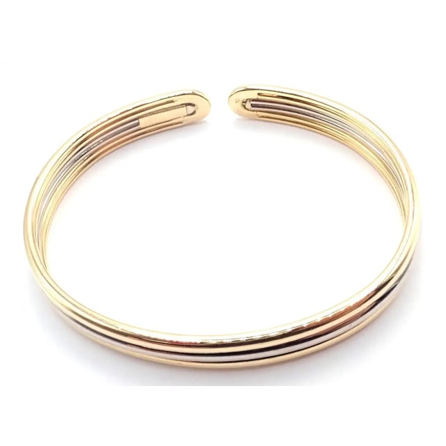 18k White & Yellow Gold Cuff Bangle Bracelet by Van Cleef & Arpels. *This bracelet comes with service paper from a Van...