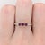 Add a touch of elegance to your wardrobe with our stunning Rhodolite Garnet Band. Crafted in 14k solid gold, this...