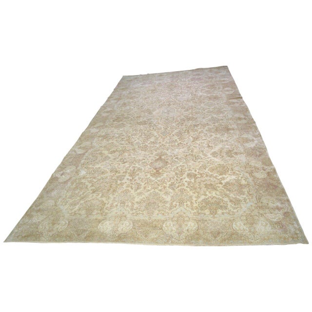 Hand-knotted with care using traditional rug-making techniques, this wool rug blends timeless craftsmanship with a modern...