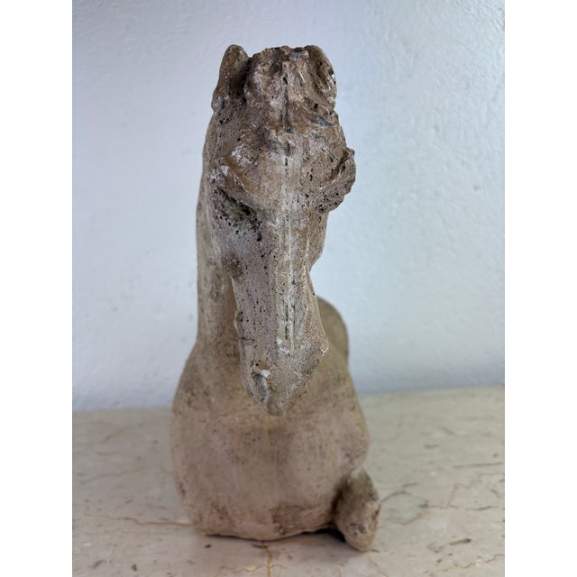 This is a mid-century vintage plaster horse sculpture. The sculpture has a taupe painted finish to the surface. The...