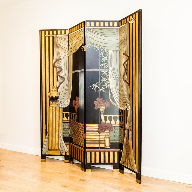 A vintage four-panel folding screen or room divider combining Hollywood Regency glamour with Chinoiserie and Neoclassical...