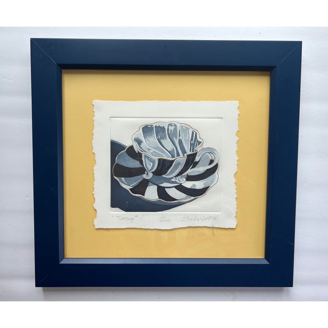 Beautiful framed limited edition 1/200 "teacup" by Sherie Wolf. Framed in blue frame. Add this whimsical piece to your...