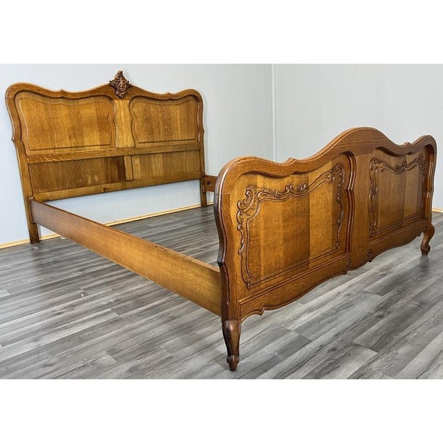 This Vintage French Louis double bed frame presents elegant proportions, flowing curves, and refined carved detailing,...