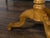An Italian wooden pedestal side table from the 19th century with octagonal top and marquetry décor depicting Saint George...