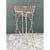 This vintage plant holder is an airy, sculptural composition of hand-bent iron wire, with a long oval planter basket...