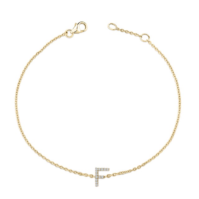 Immerse yourself in the understated elegance of this 10K yellow gold bracelet, for an enrapturing shimmer that captures...