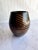 This beautiful signed (possibly Dawn?) studio pottery vase showcases a rich earthy brown and lighter brown glaze, accented...